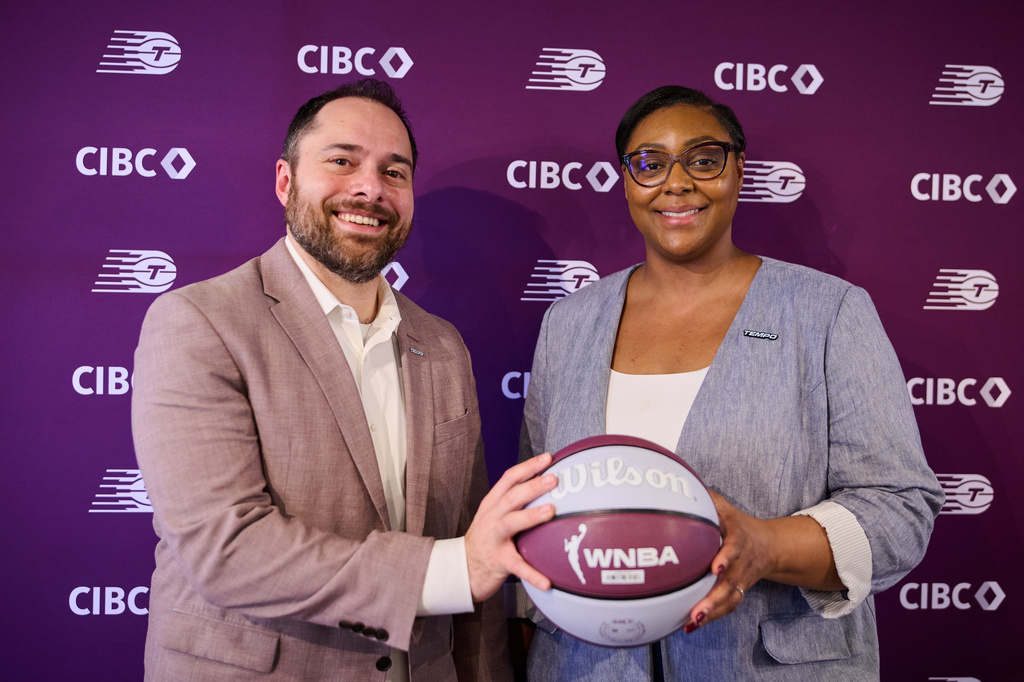 Toronto Tempo general manager Monica Wright Rogers, right, and assistant general manager Eli Horowitz pose for a photo after speaking to media following the WNBA Expansion Draft in Toronto, Friday, April 3, 2026. (Sammy Kogan/The Canadian Press via AP)
