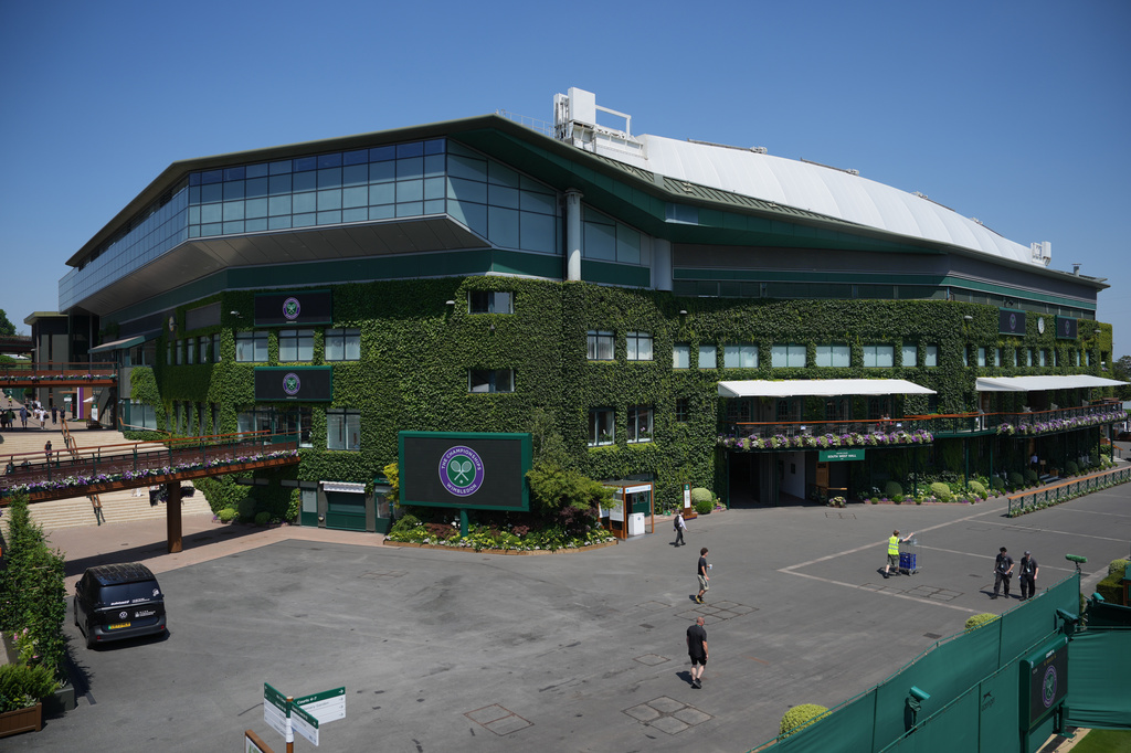 A general view of Centre Court as final preparations are made ahead of the Wimbledon tennis championships in London, Wednesday, June 24, 2026. (AP Photo/Kin Cheung)