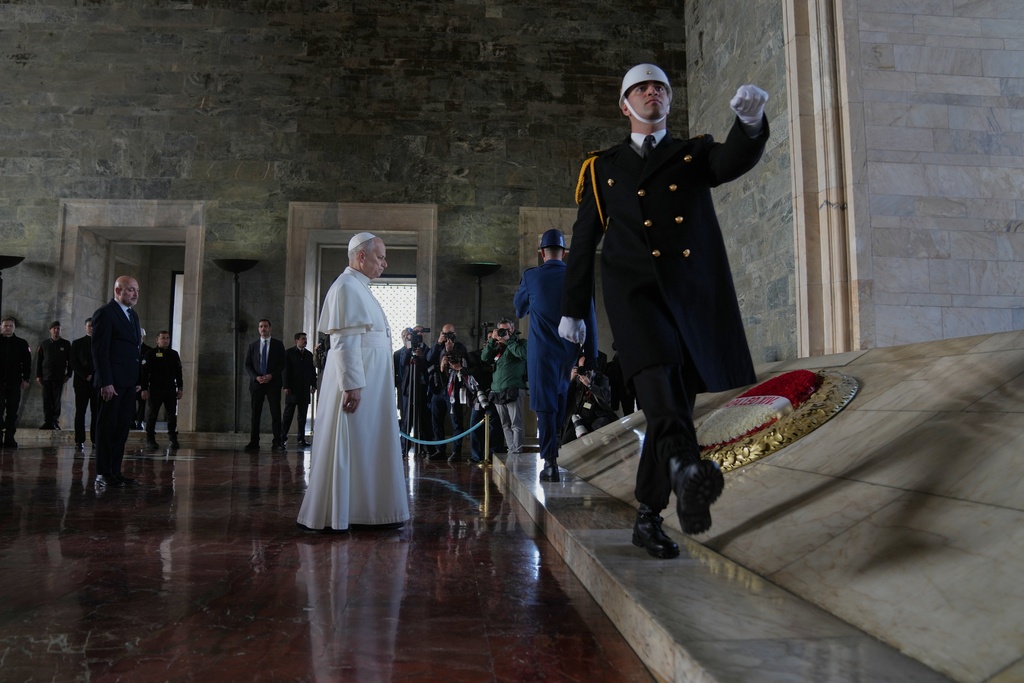 Pope Leo XIV poses a wreath at the Ataturk Mausoleum in Ankara, Turkey, Thursday, Nov. 27, 2025. (AP Photo/Domenico Stinellis)