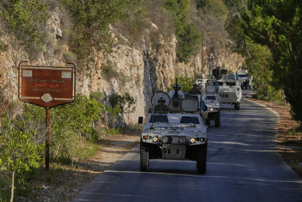 French U.N. peacekeepers patrol at the Suluki Valley, south Lebanon, Wednesday, Aug. 20, 2025. (AP Photo/Hussein Malla)