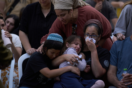 Relatives mourn during the funeral of the Israeli-American reservist Master Sergeant Yona Efraim Feldbaum, who was killed in the Gaza Strip, at Mount Herzl military cemetery, in Jersualem, Wednesday, Oct. 29, 2025. (AP Photo/Leo Correa) Relatives mourn during the funeral of the Israeli-American reservist Master Sergeant Yona Efraim Feldbaum, who was killed in the Gaza Strip, at Mount Herzl military cemetery, in Jersualem, Wednesday, Oct. 29, 2025. (AP Photo/Leo Correa)