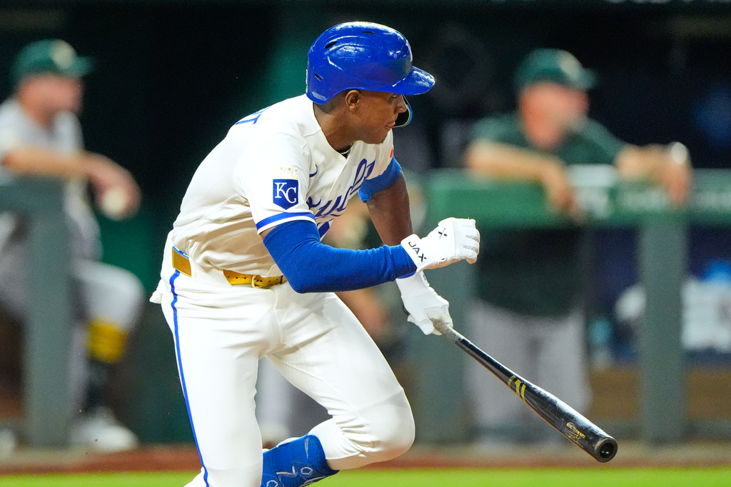 Kansas City Royals' Tyler Tolbert runs to first after hitting a two-run single during the ninth inning of a baseball game against the Athletics, Tuesday, Aug. 18, 2026, in Kansas City, Mo. (AP Photo/Charlie Riedel)