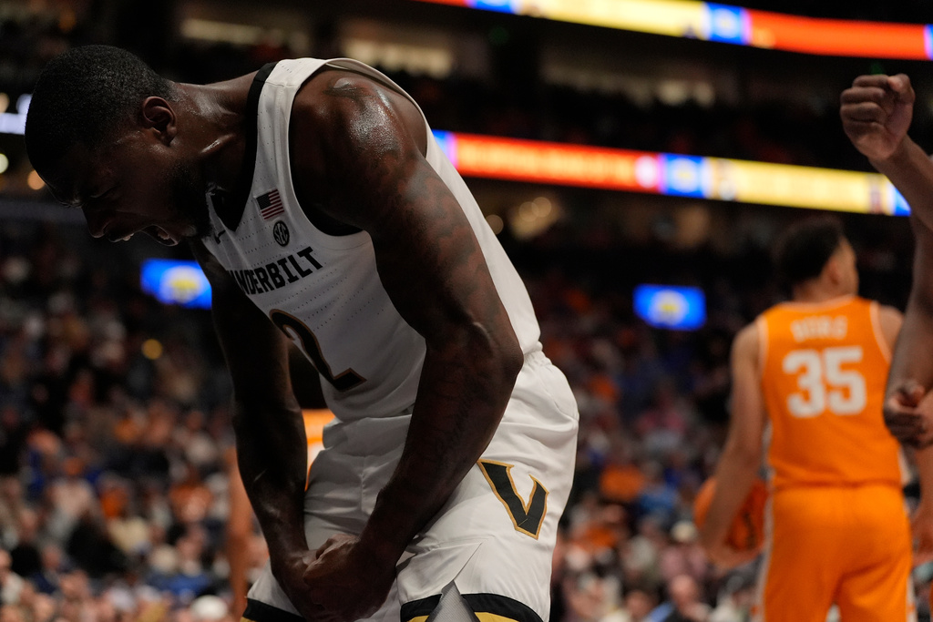 Vanderbilt guard Duke Miles (2) celebrates his shot and a foul against Tennessee during the second half of an NCAA college basketball game in the quarterfinal round of the Southeastern Conference tournament, Friday, March 13, 2026, in Nashville, Tenn. (AP Photo/George Walker IV)