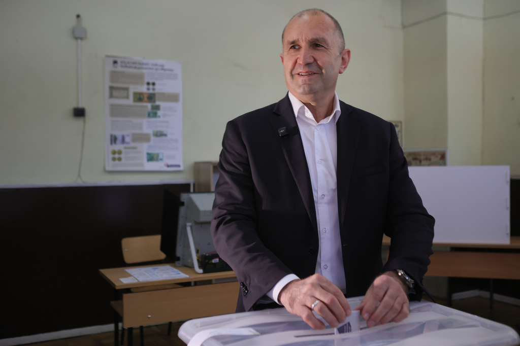 Former Bulgarian President Rumen Radev casts his vote at a polling station in Sofia, Bulgaria, Sunday, April 19, 2026, during early parliamentary elections. (AP Photo/Valentina Petrova)