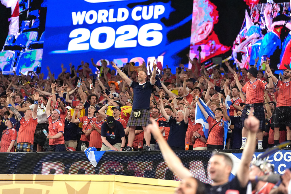 Scotland fans celebrate a win following the World Cup Group C soccer match between Haiti and Scotland in Foxborough, Mass., near Boston, Saturday, June 13, 2026. (AP Photo/Charlie Krupa)