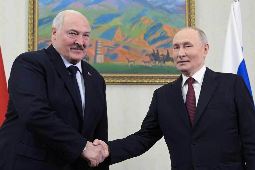 FILE - Belarusian President Alexander Lukashenko, left, and Russian President Vladimir Putin pose for a photo prior to the talks in Bishkek, Kyrgyzstan, on Wednesday, Nov. 26, 2025. (Alexei Nikolsky, Sputnik, Kremlin Pool Photo via AP, File)