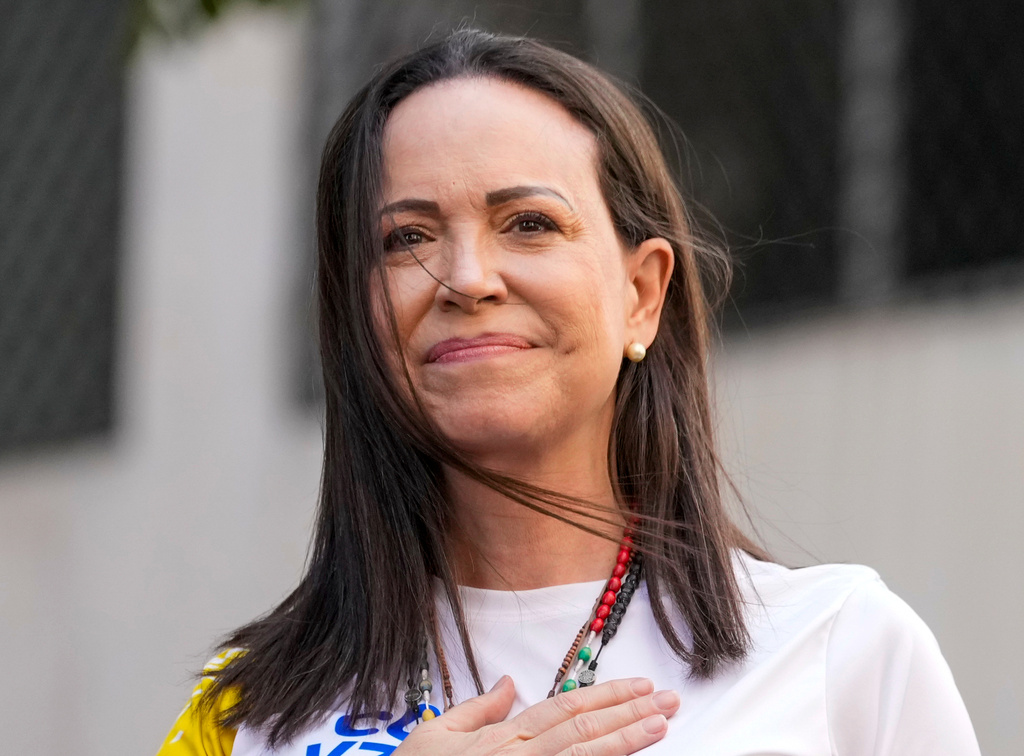 FILE - Opposition leader Maria Corina Machado gestures to supporters during a protest against President Nicolas Maduro the day before his inauguration for a third term, in Caracas, Venezuela, Thursday, Jan. 9, 2025. (AP Photo/Ariana Cubillos, file)