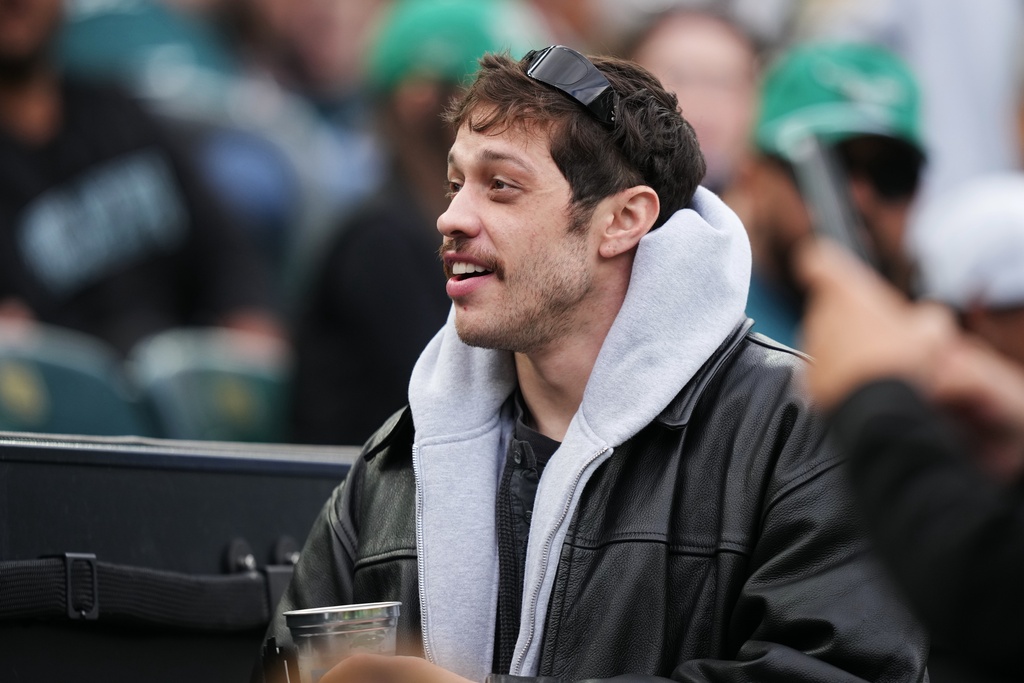 Actor and comedian Pete Davidson attends the second half of an NFL football game between the Philadelphia Eagles and the New York Giants on Sunday, Oct. 26, 2025, in Philadelphia. (AP Photo/Matt Slocum)