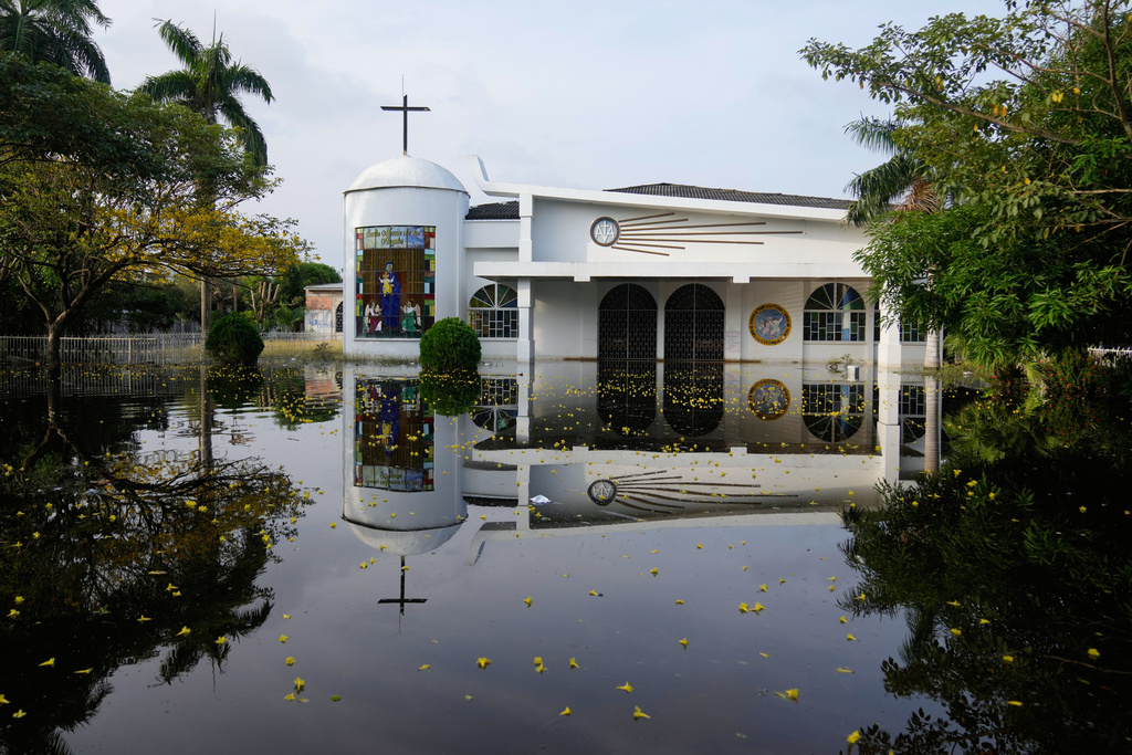 The Maria de los Angeles Church is flooded after the Sinu River overflowed in Monteria, Colombia, Tuesday, Feb. 10, 2026. (AP Photo/Fernando Vergara))
