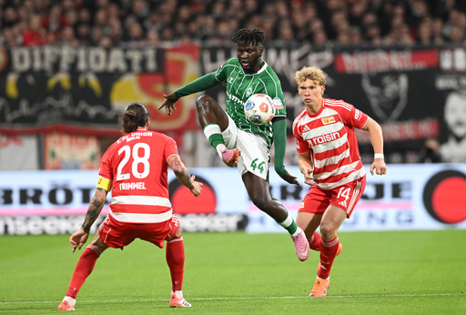Bremen's Victor Boniface competes for the ball with Berlin's Christopher Trimmel, left, and Leopold Querfeld during the Bundesliga soccer match between FC Union Berlin, Matchday 8, at Weserstadion in Bremen, Germany, Friday Oct. 24, 2025. (Carmen Jaspersen/dpa via AP) Bremen's Victor Boniface competes for the ball with Berlin's Christopher Trimmel, left, and Leopold Querfeld during the Bundesliga soccer match between FC Union Berlin, Matchday 8, at Weserstadion in Bremen, Germany, Friday Oct. 24, 2025. (Carmen Jaspersen/dpa via AP)