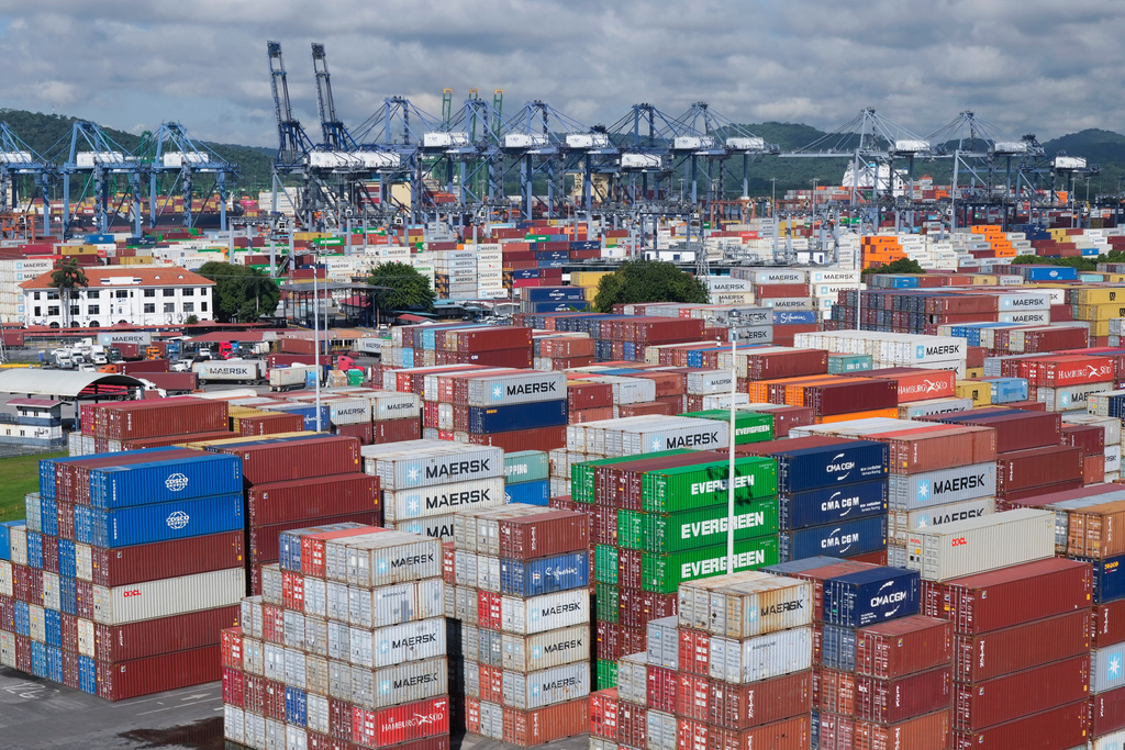 FILE - Ship containers are stacked at the Panama Canal Balboa port, operated by the Panama Ports Company, in Panama City, Sept. 20, 2025. (AP Photo/Matias Delacroix, File)