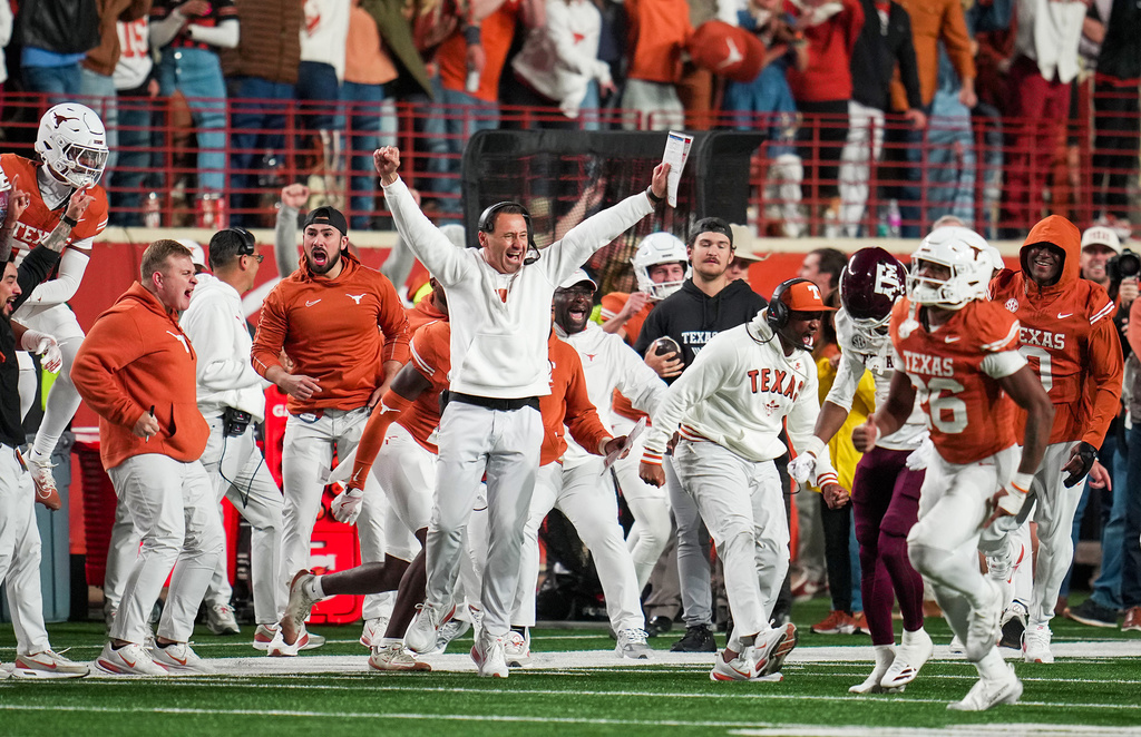 Texas Longhorns head coach Steve Sarkisian celebrates a interception late in the 4th quarter against Texas A&M Aggies offense in an NCAA college football game in the Lone Star Showdown in Austin, Texas, Friday, Nov. 28, 2025. Ricardo B. Brazziell/Austin American-Statesman via AP)