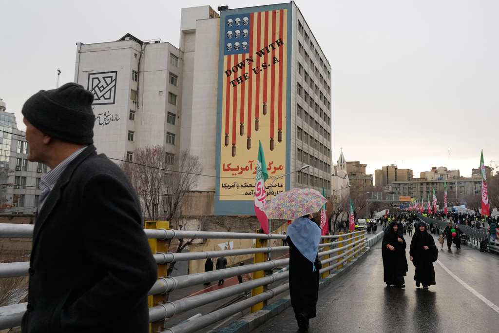 People attend a state-organised rally in Tehran, Iran, Wednesday, Feb. 4, 2026, celebrating the birthday of Imam Mahdi, or "Hidden Imam," a 9th-century saint whom Shiite Muslims believe will return at the end of time as a universal reformer to end tyranny and promote justice. (AP Photo/Vahid Salemi)