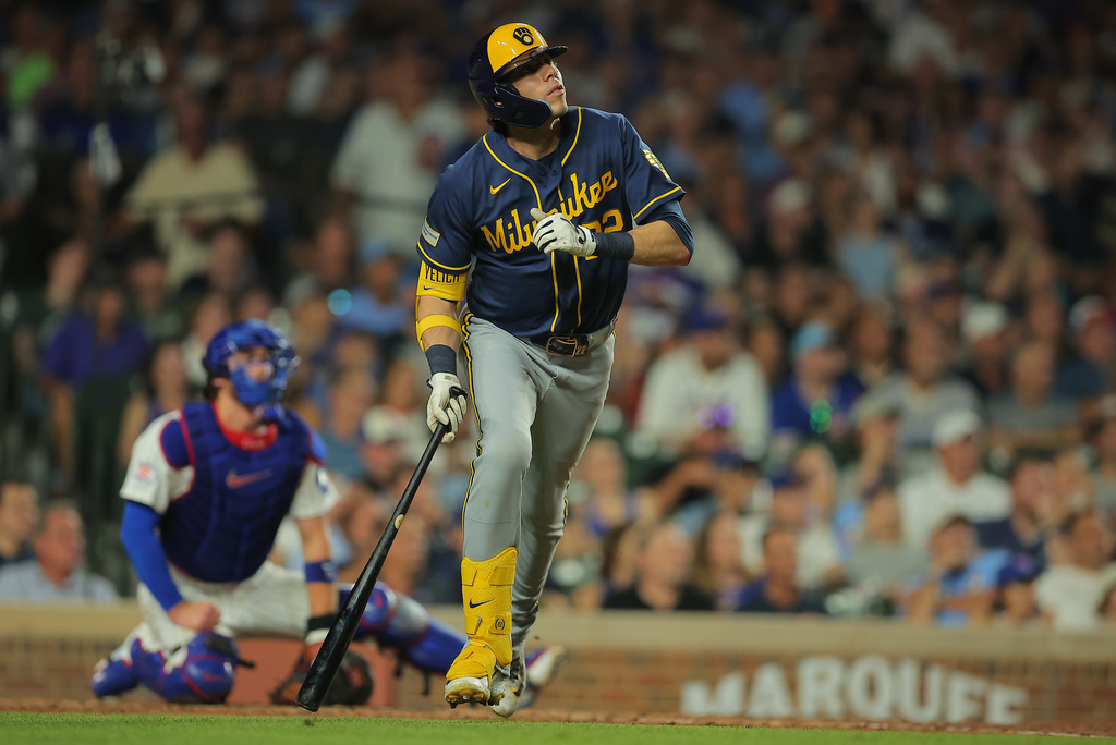 Milwaukee Brewers' Christian Yelich watches his two-run home run during the sixth inning of a baseball game against the Chicago Cubs, Tuesday, Sept. 1, 2026, in Chicago. (AP Photo/Melissa Tamez)