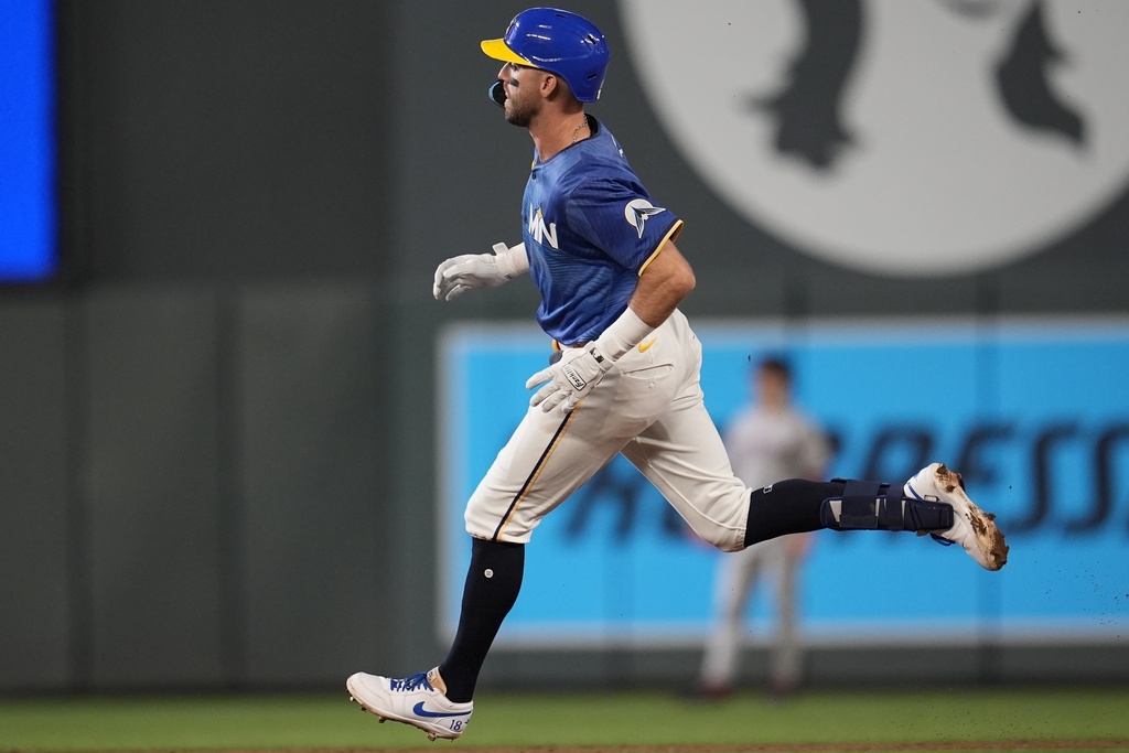 Minnesota Twins' Kody Clemens (18) runs to second base on his RBI-double in the sixth a baseball game against the Arizona Diamondbacks, Friday, Sept. 12, 2025, in Minneapolis. (AP Photo/Mike Stewart)