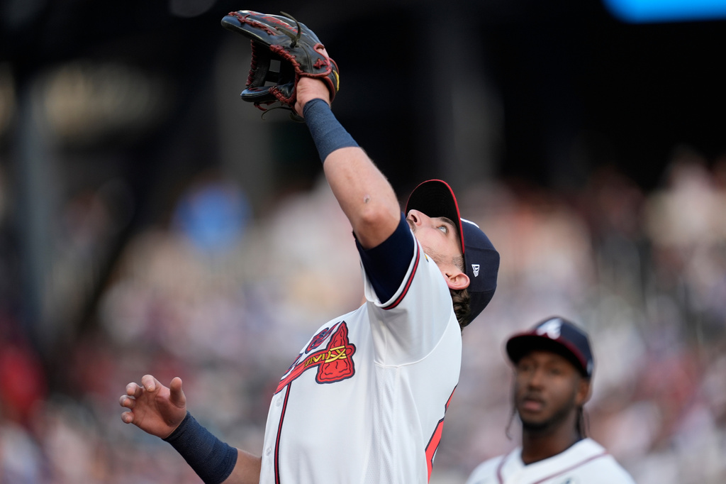 Atlanta Braves third baseman Austin Riley (27) makes the catch off the bat of Toronto Blue Jays' Nathan Lukes in the first inning of a baseball game, Tuesday, June 2, 2026, in Atlanta. (AP Photo/Mike Stewart)
