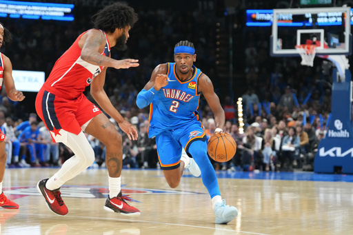 Oklahoma City Thunder guard Shai Gilgeous-Alexander, right, drives past Washington Warriors forward Marvin Bagley III, left, during the second half of an NBA basketball game, Thursday, Oct. 30, 2025, in Oklahoma City. (AP Photo/Kyle Phillips) Oklahoma City Thunder guard Shai Gilgeous-Alexander, right, drives past Washington Warriors forward Marvin Bagley III, left, during the second half of an NBA basketball game, Thursday, Oct. 30, 2025, in Oklahoma City. (AP Photo/Kyle Phillips)