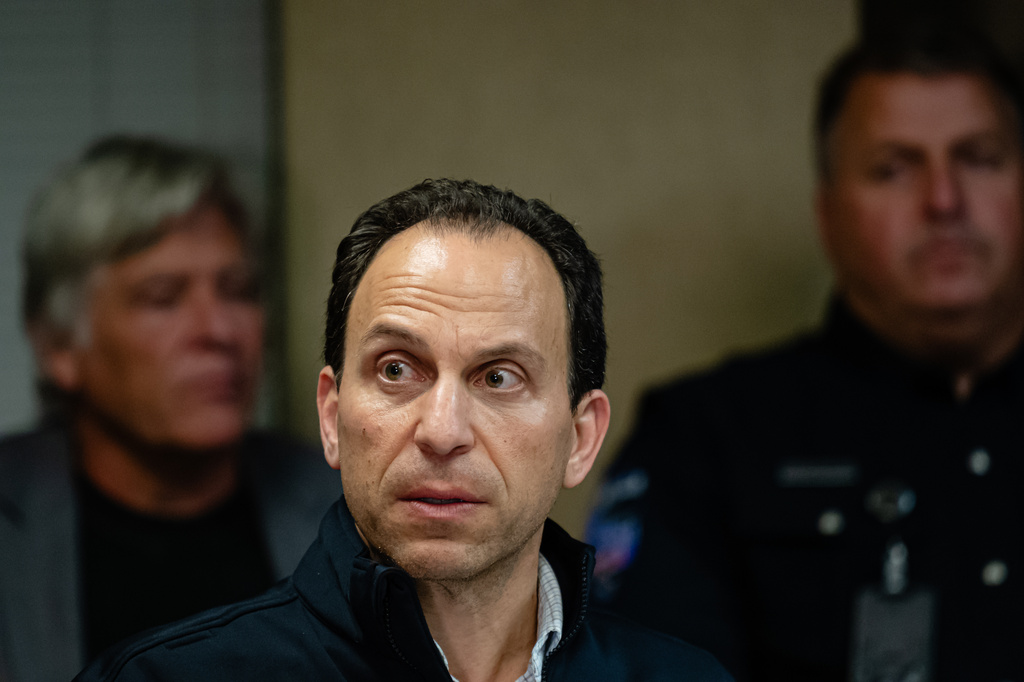 Mayor Craig Greenberg speaks at Louisville Regional Airport Authority about the crash of UPS Flight 2796 at Louisville Muhammad Ali International Airport on Tuesday, Nov. 4, 2025, in Louisville, Ky. (AP Photo/Jon Cherry)