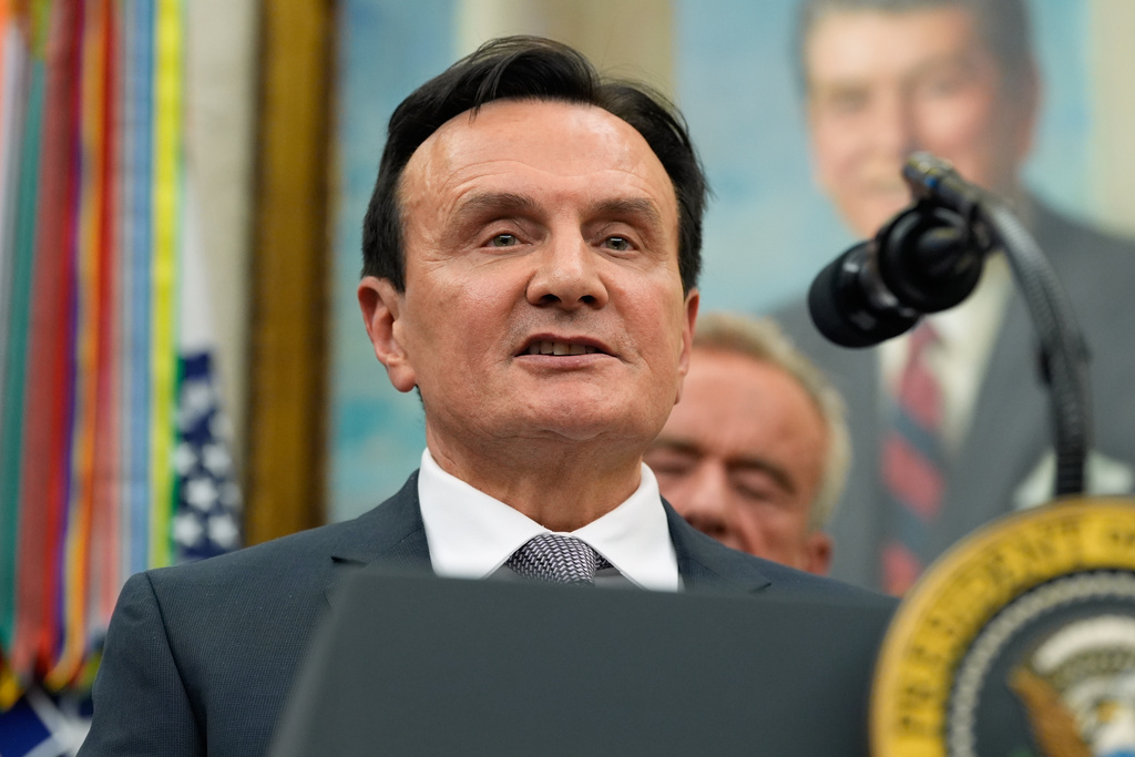 AstraZeneca CEO Pascal Soriot speaks in the Oval Office of the White House during an event with President Donald Trump, Friday, Oct. 10, 2025, in Washington. (AP Photo/Alex Brandon)