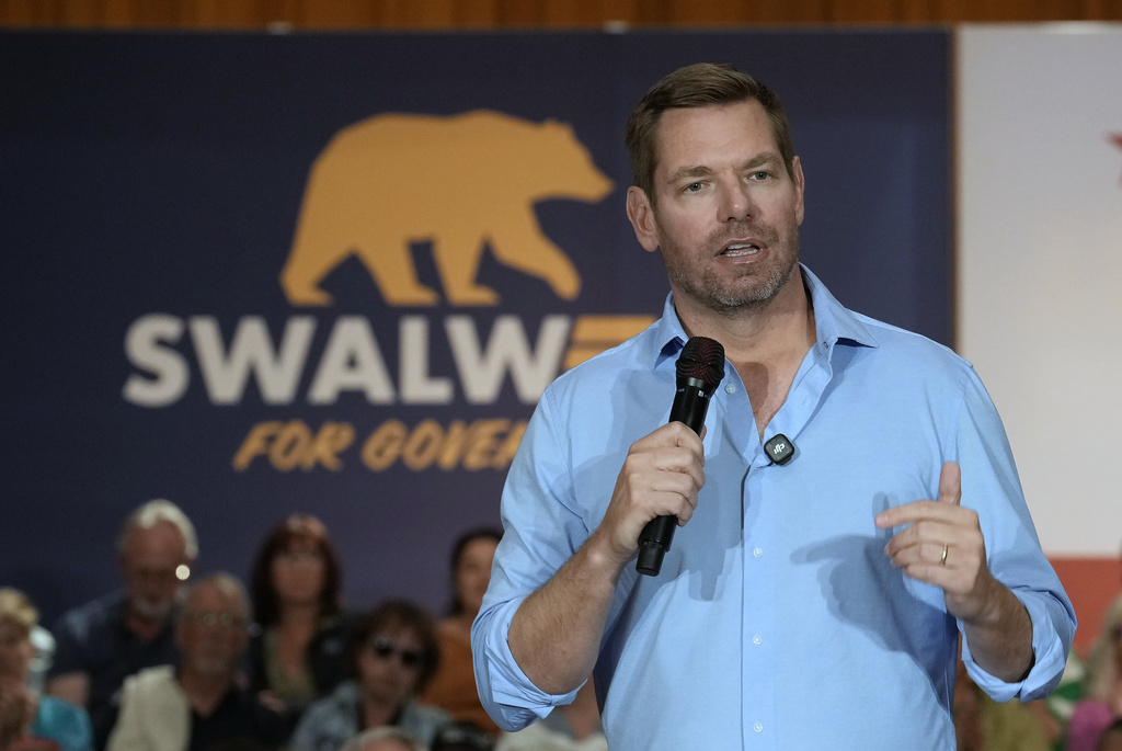 California gubernatorial candidate, Rep. Eric Swalwell, D-CA appears at a town hall meeting in Sacramento, Calif., Tuesday, April 7, 2026. (AP Photo/Rich Pedroncelli)