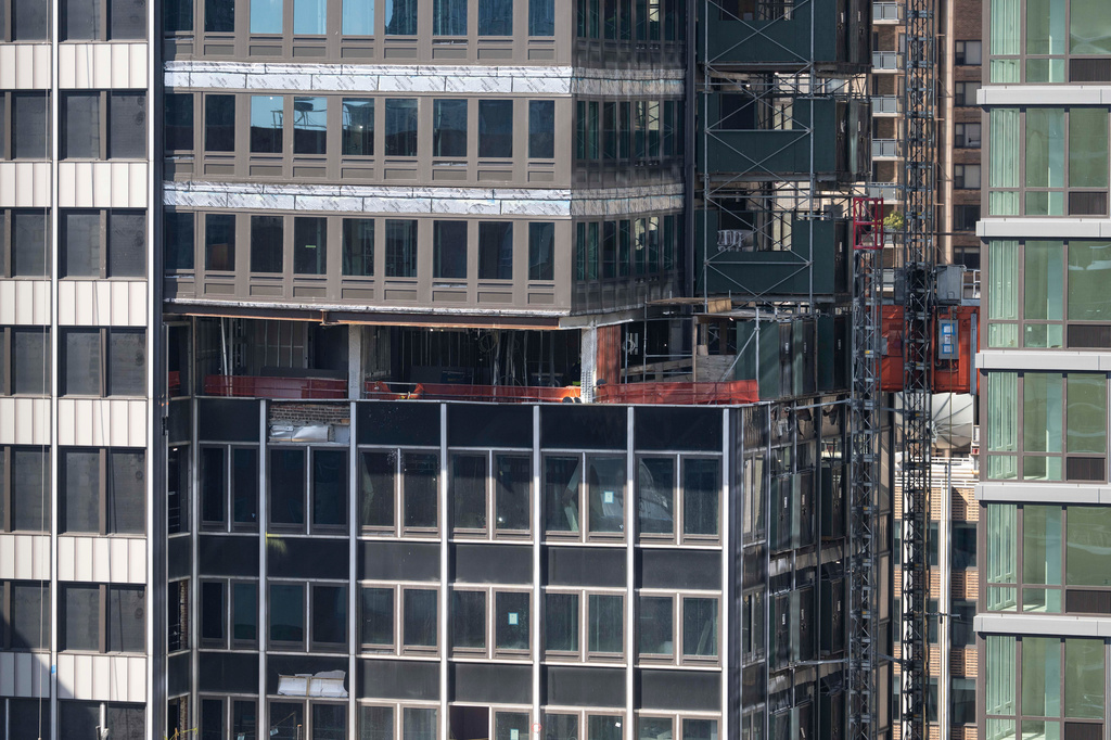 A buckled support beam is seen inside 235 East 42nd Street, Wednesday, July 8, 2026, in New York. (AP Photo/Yuki Iwamura)