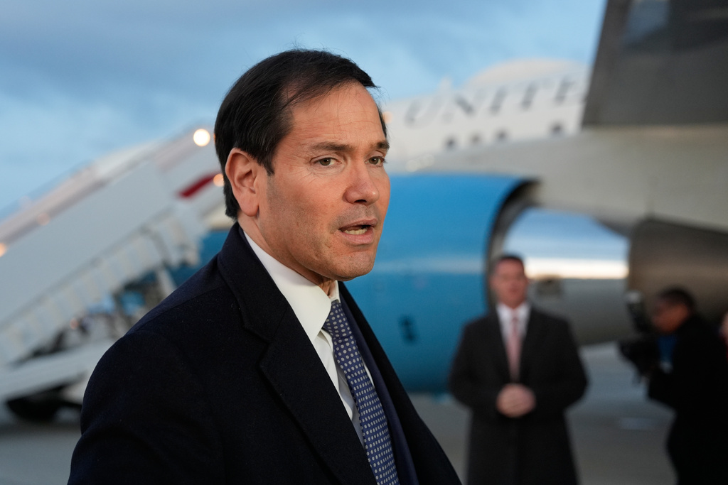 Secretary of State Marco Rubio speaks to reporters before boarding his plane, Thursday, Feb. 12, 2026, at Joint Base Andrews, Md., en route to the Munich Security Conference. (AP Photo/Alex Brandon, Pool)