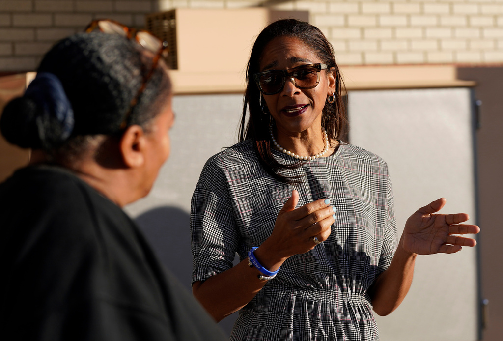 Virginia House of Delegates, Del.-elect, Nicole Cole, right, speaks with constituents Thursday, Nov. 13, 2025, in Fredericksburg, Va. (Steve Helber)
