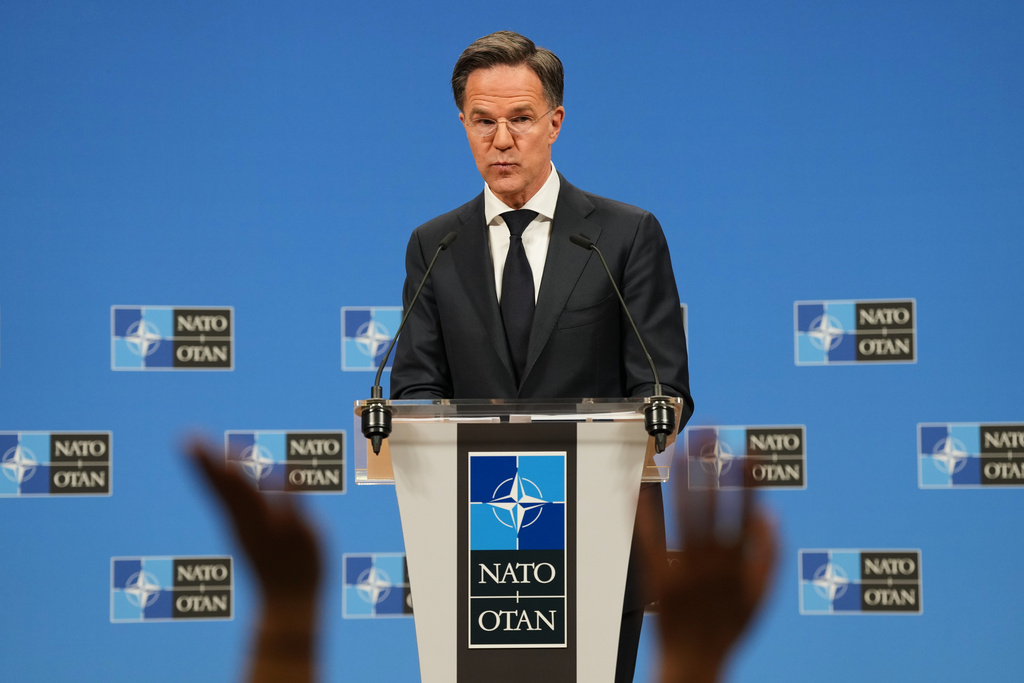 NATO Secretary General Mark Rutte takes questions from journalists during the launch of the NATO Secretary General's Annual Report for 2025 at NATO headquarters in Brussels, Thursday, March 26, 2026. (AP Photo/Virginia Mayo)