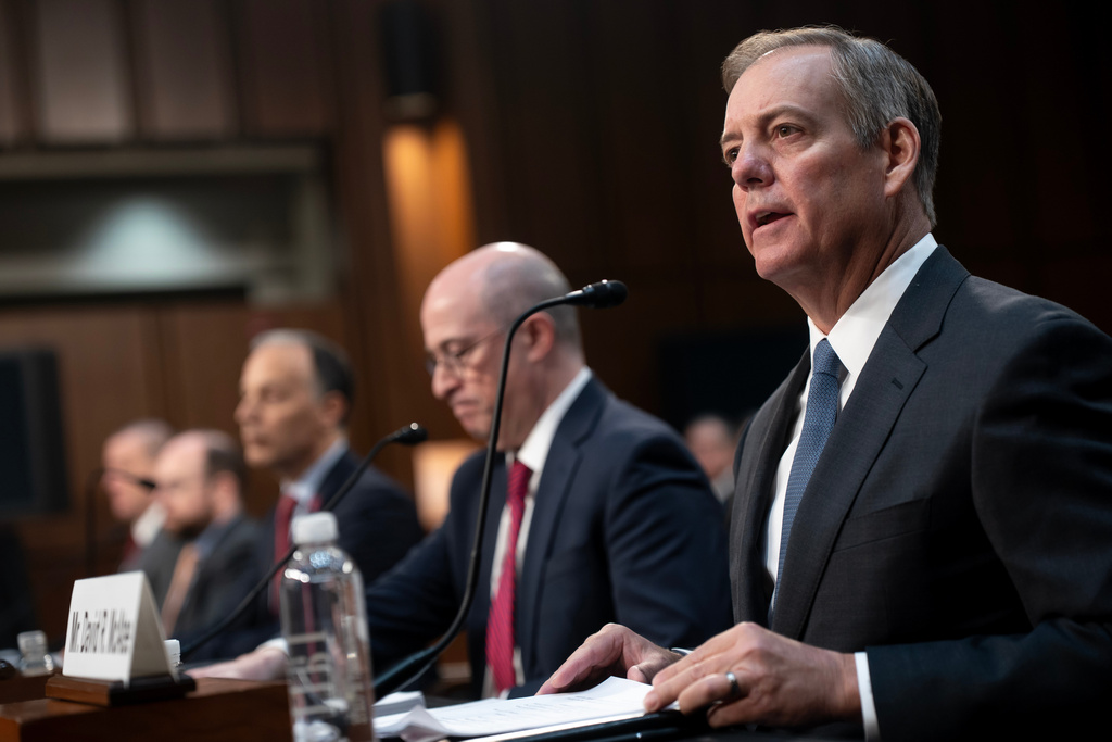 David R. McAtee, right, senior executive vice president and general counsel for AT&T, testifies during a Senate Committee on the Judiciary, Subcommittee on Privacy, Technology, and the Law hearing to examine Arctic Frost accountability, focusing on oversight of telecommunications carriers on Capitol Hill in Washington, Tuesday, Feb. 10, 2026. (AP Photo/Nathan Howard)