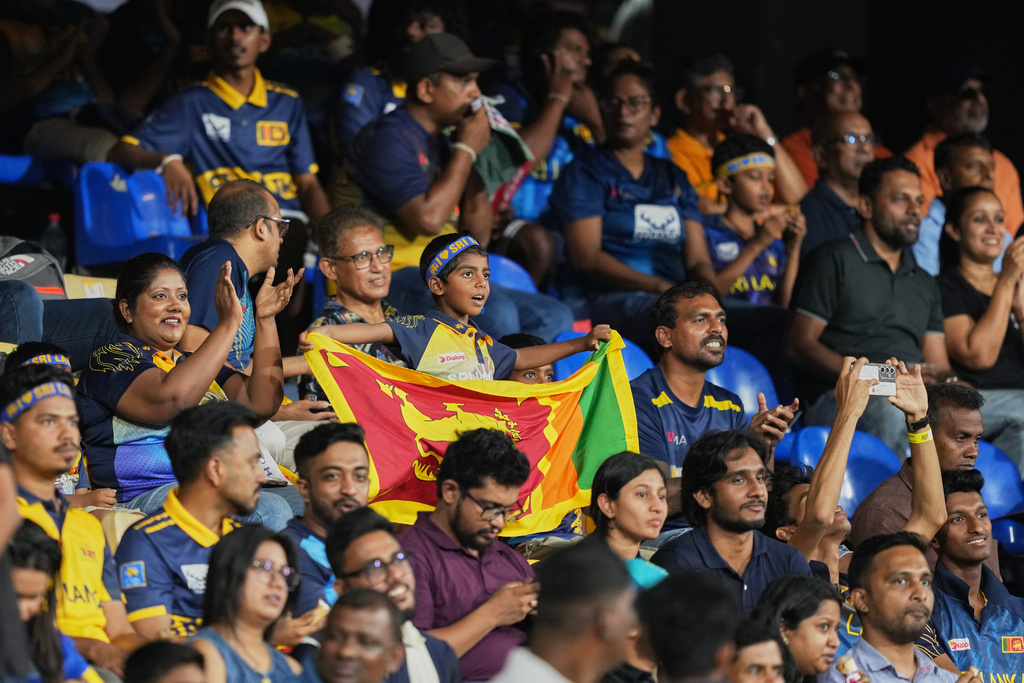 Sri Lankan supporters cheer for their team before the start of the T20 World Cup cricket match between Sri Lanka and New Zealand in Colombo, Sri Lanka, Wednesday, Feb. 25, 2026. (AP Photo/Eranga Jayawardena)
