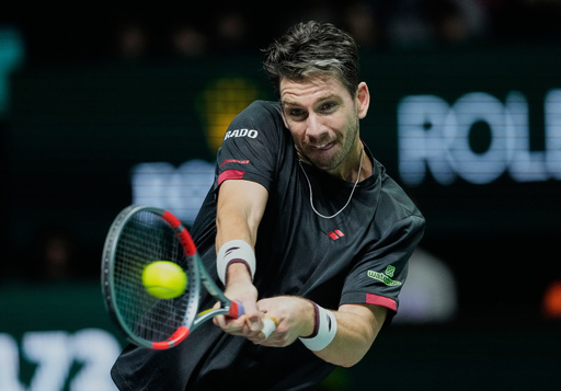 Cameron Norrie of Great Britain returns the ball to Valentin Vacherot of Monaco during their third round men's singles match at the Paris Masters tennis tournament at the Paris La Defense Arena, Thursday, Oct. 30, 2025, in Paris. (AP Photo/Michel Euler) Cameron Norrie of Great Britain returns the ball to Valentin Vacherot of Monaco during their third round men's singles match at the Paris Masters tennis tournament at the Paris La Defense Arena, Thursday, Oct. 30, 2025, in Paris. (AP Photo/Michel Euler)