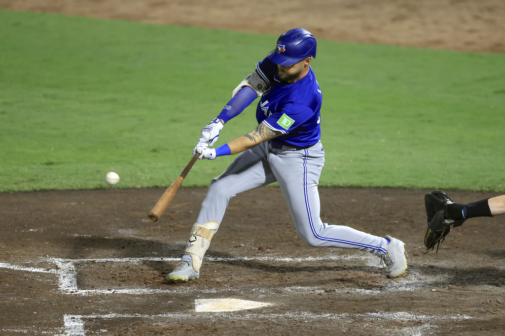 Toronto Blue Jays' Nathan Lukes hits a home run against the Tampa Bay Rays during the fourth inning of a baseball game Tuesday, Sept. 16, 2025, in Tampa, Fla. (AP Photo/Mike Carlson)