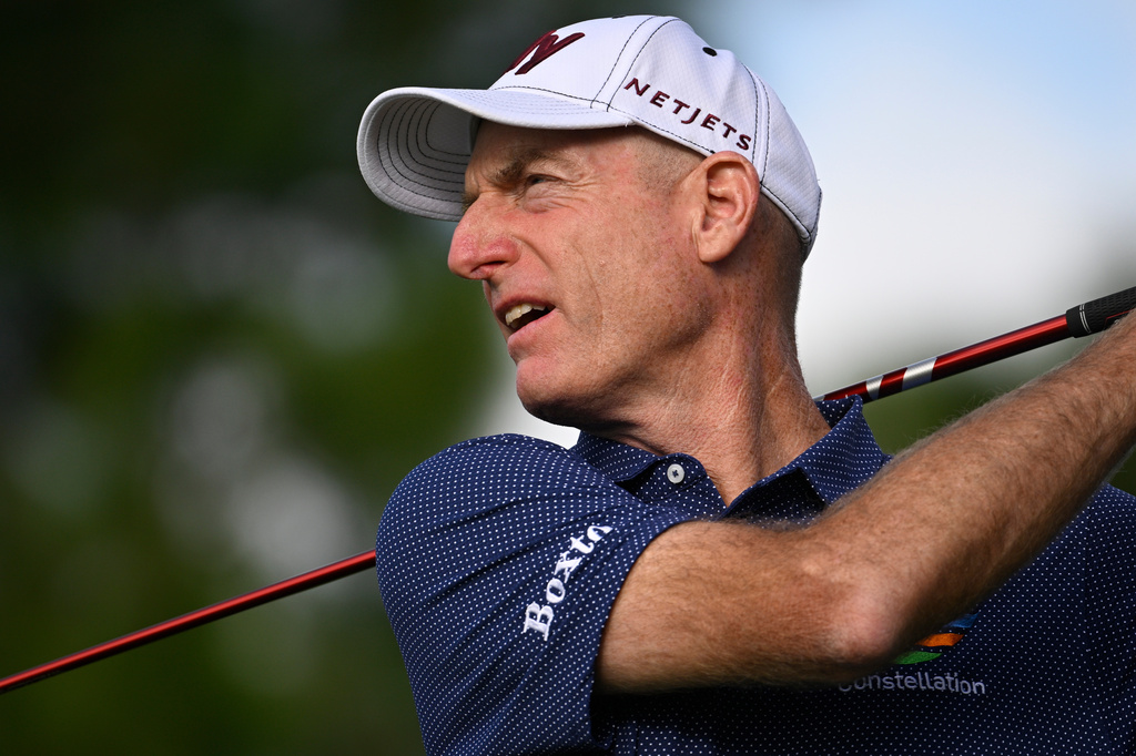 Jim Furyk watches his tee shot on the second hole during the final round of the PNC Championship golf tournament, Sunday, Dec. 21, 2025, in Orlando, Fla. (AP Photo/Phelan M. Ebenhack)