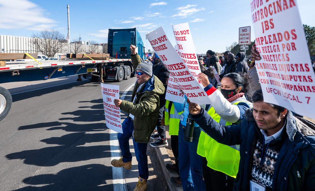 Workers from the JBS Beef Plant protest across the road from the plant on March 16, 2026 in Greeley, Colo. (Jerilee Bennett/The Gazette via AP)