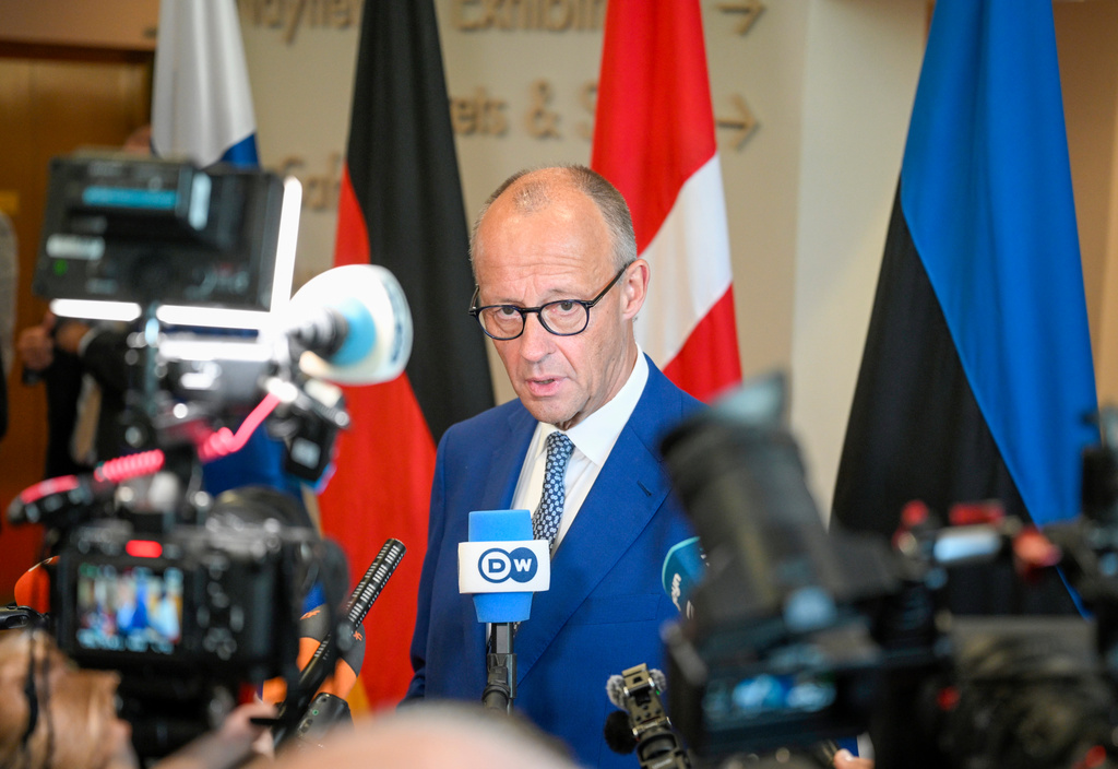 Federal Chancellor of Germany Friedrich Merz speaks to media during the European Arctic Summit in Rovaniemi, Finland, Monday, Sept. 14, 2026. (Jouni Porsanger/Lehtikuva via AP)