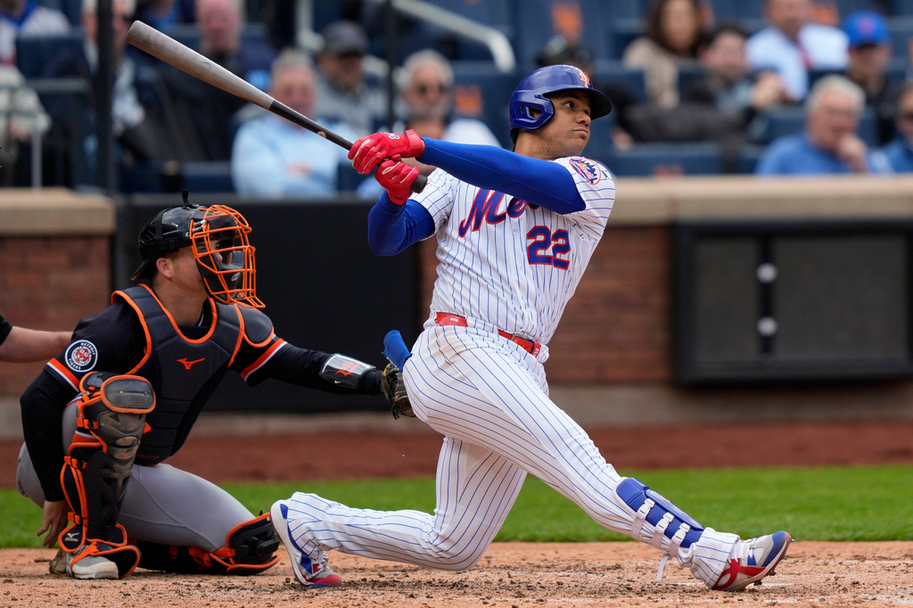 New York Mets designated hitter Juan Soto (22) hits a home run during the seventh inning of a baseball game against the Detroit Tigers, Thursday, May 14, 2026, in New York. (AP Photo/Yuki Iwamura)