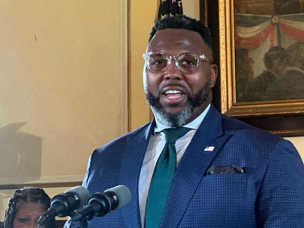 Rep. Kam Buckner, D-Chicago, talks to reporters at the state Capitol, Tuesday, Aug. 12, 2025, in Springfield, Ili. (John O'Connor/AP)