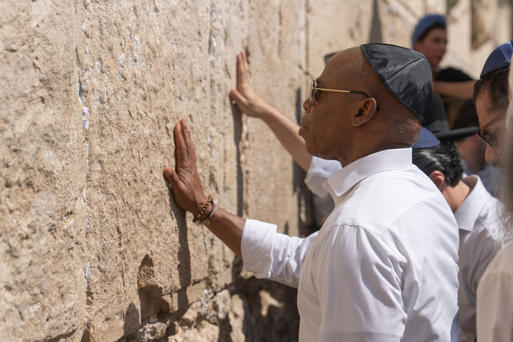 FILE - New York Mayor Eric Adams visits the Western Wall, the holiest spot where Jews can pray, in Jerusalem, Aug. 22, 2023. (AP Photo/Ohad Zwigenberg, File)
