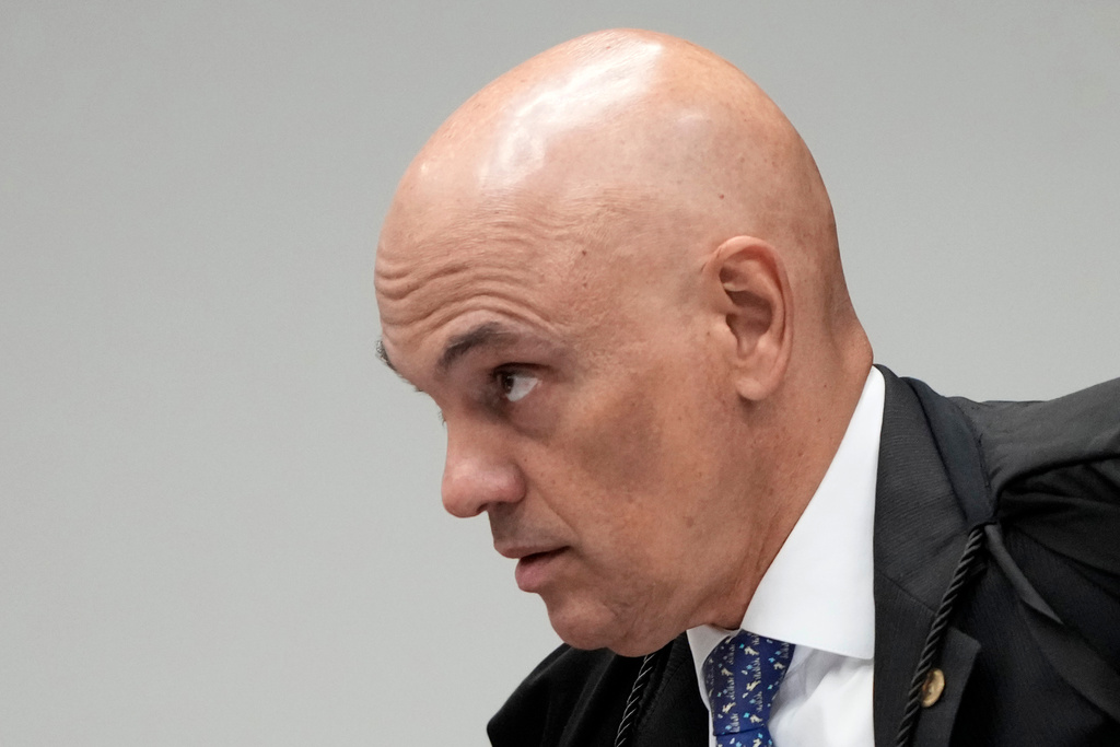 Judge Alexandre de Moraes attends the second day of the trial of those accused of ordering the murder of councilwoman Marielle Franco at the Supreme Court in Brasilia, Brazil, Wednesday, Feb. 25, 2026. (AP Photo/Eraldo Peres)