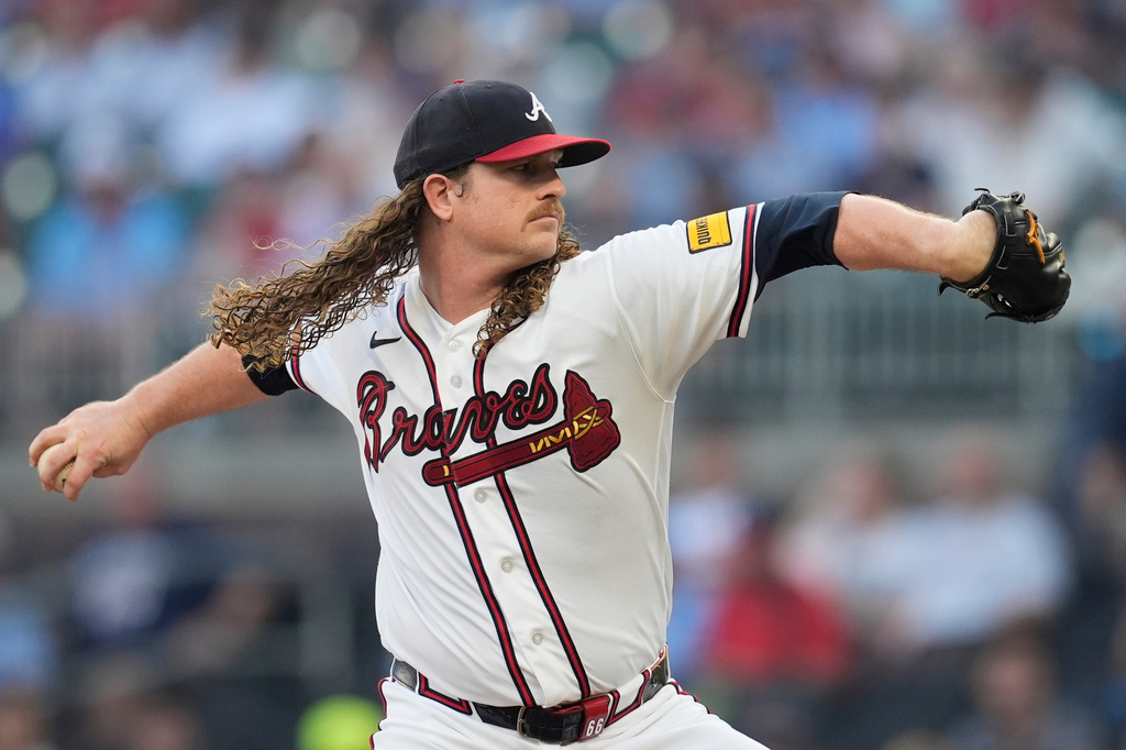 Atlanta Braves pitcher Grant Holmes (66) works from the bump against the Miami Marlins in the first inning of a baseball game, Tuesday, Aug. 4, 2026, in Atlanta. (AP Photo/Mike Stewart)