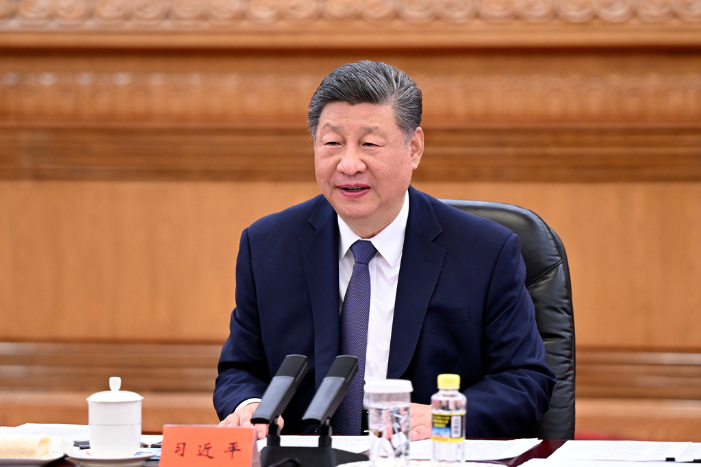 In this photo released by Xinhua News Agency, Chinese President Xi Jinping, speaks during a meeting with Kuomintang (KMT) party leader Cheng Li-wun, unseen at the Great Hall of the People in Beijing on Friday, April 10, 2026. (Xie Huanchi/Xinhua via AP)