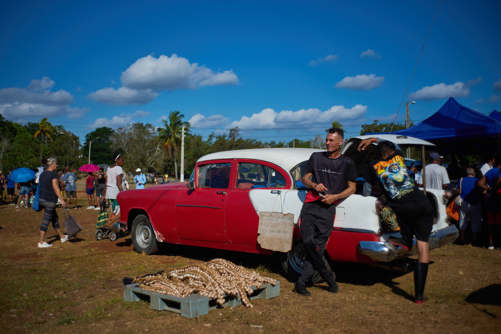 Vendors wait for customers at a weekly food fair in Alamar, Havana province, Cuba, Saturday, May 2, 2026. (AP Photo/Ramon Espinosa)