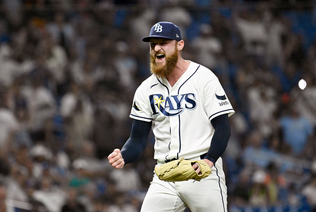 Tampa Bay Rays pitcher Bryan Baker celebrates after striking out New York Yankees' Jasson Domínguez, not pictured, for the final out of the Rays 3-0 win in a baseball game Wednesday, July 8, 2026, in St. Petersburg, Fla. (AP Photo/Jason Behnken)
