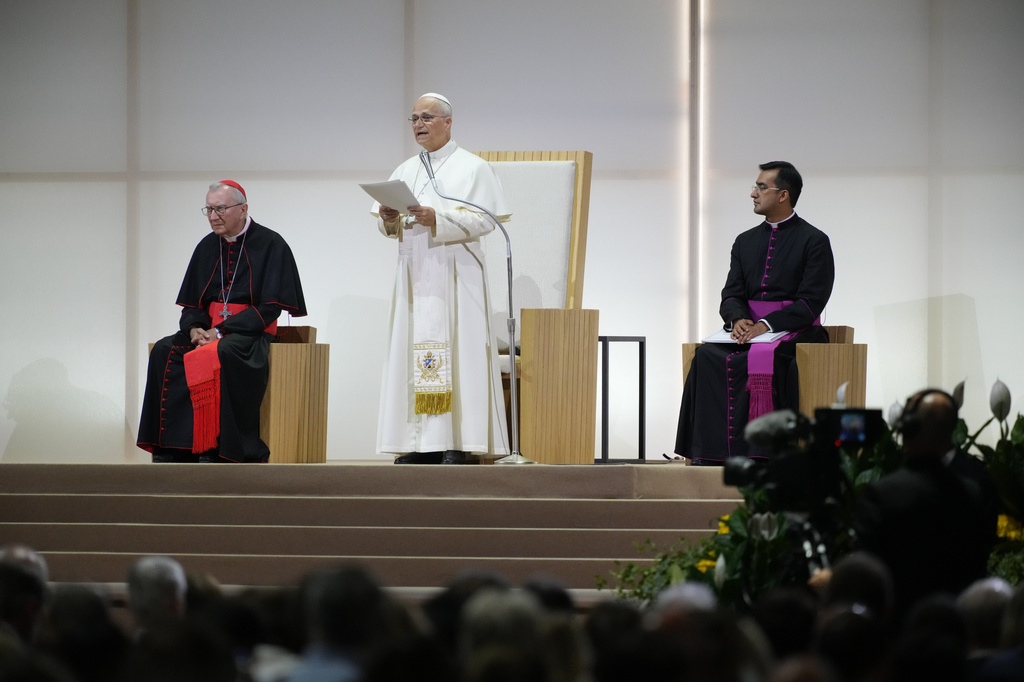 Pope Leo XIV delivers his message at the 47th Meeting for Friendship Among Peoples in Rimini, Italy, Saturday, Aug. 22, 2026. (AP Photo/Andrew Medichini)