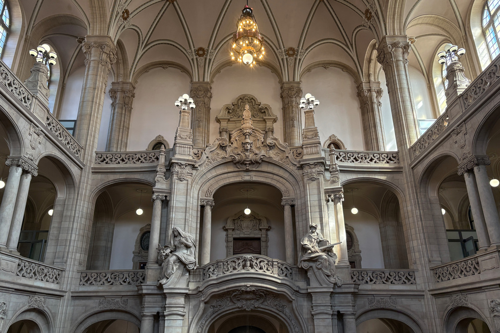 The main entrance of the regional court is pictured in Berlin, Germany, July 2, 2026, before a trial against a network of predominantly Chinese men who had organized themselves into chat groups to discuss how to drug and rape predominantly Chinese women. (AP Photo/Fanny Brodersen)