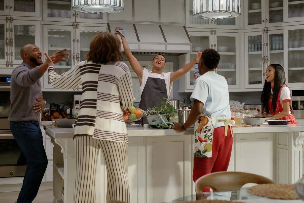 This image released by Peacock shows, from left, Adrian Holmes as Philip, Cassandra Freeman as Vivan, Jabari Banks as Will, Olly Sholotan as Carlton, and Akira Akbar as Ashley, in a scene from Bel-Air." (Anne Marie Fox/Peacock via AP)