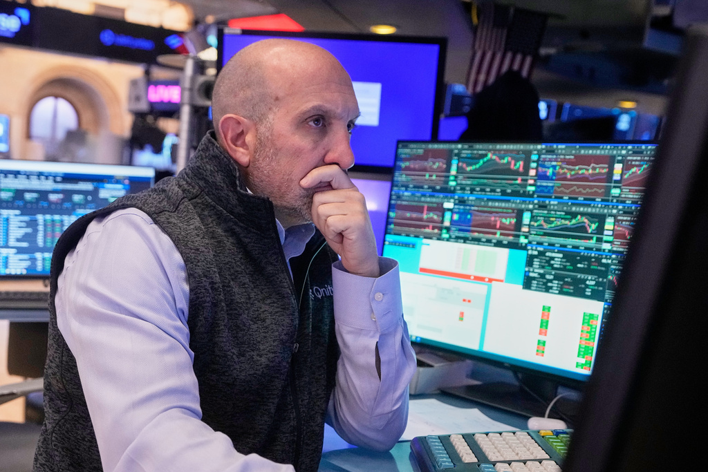 Specialist James Denaro works at his post on the floor of the New York Stock Exchange, Wednesday, Nov. 5, 2025. (AP Photo/Richard Drew)