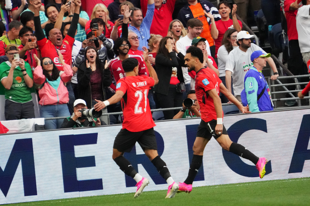 Egypt's Mahmoud Saber (21) celebrates after scoring before the World Cup Group G soccer match between Egypt and Iran in Seattle, Friday, June 26, 2026. (AP Photo/Ted S. Warren)