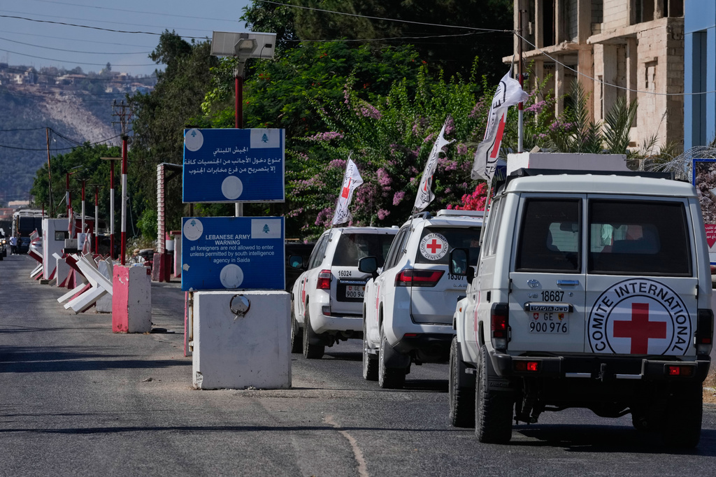 A Red Cross convoy passes a Lebanese checkpoint near the border with Israel in the southern village of Mansouri, Lebanon, Friday, Sept. 4, 2026. (AP Photo/Mohammed Zaatari) CORRECTION: A Red Cross convoy, instead of U.N. peacekeeper convoy