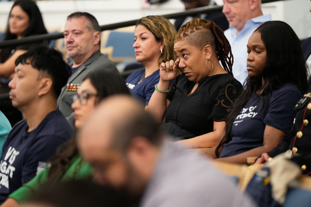 People react during an oversight forum on Friday, July 24, 2026, in Houston, about the death of Lorenzo Salgado Araujo, who was shot and killed by an ICE officer. (AP Photo/Ashley Landis)